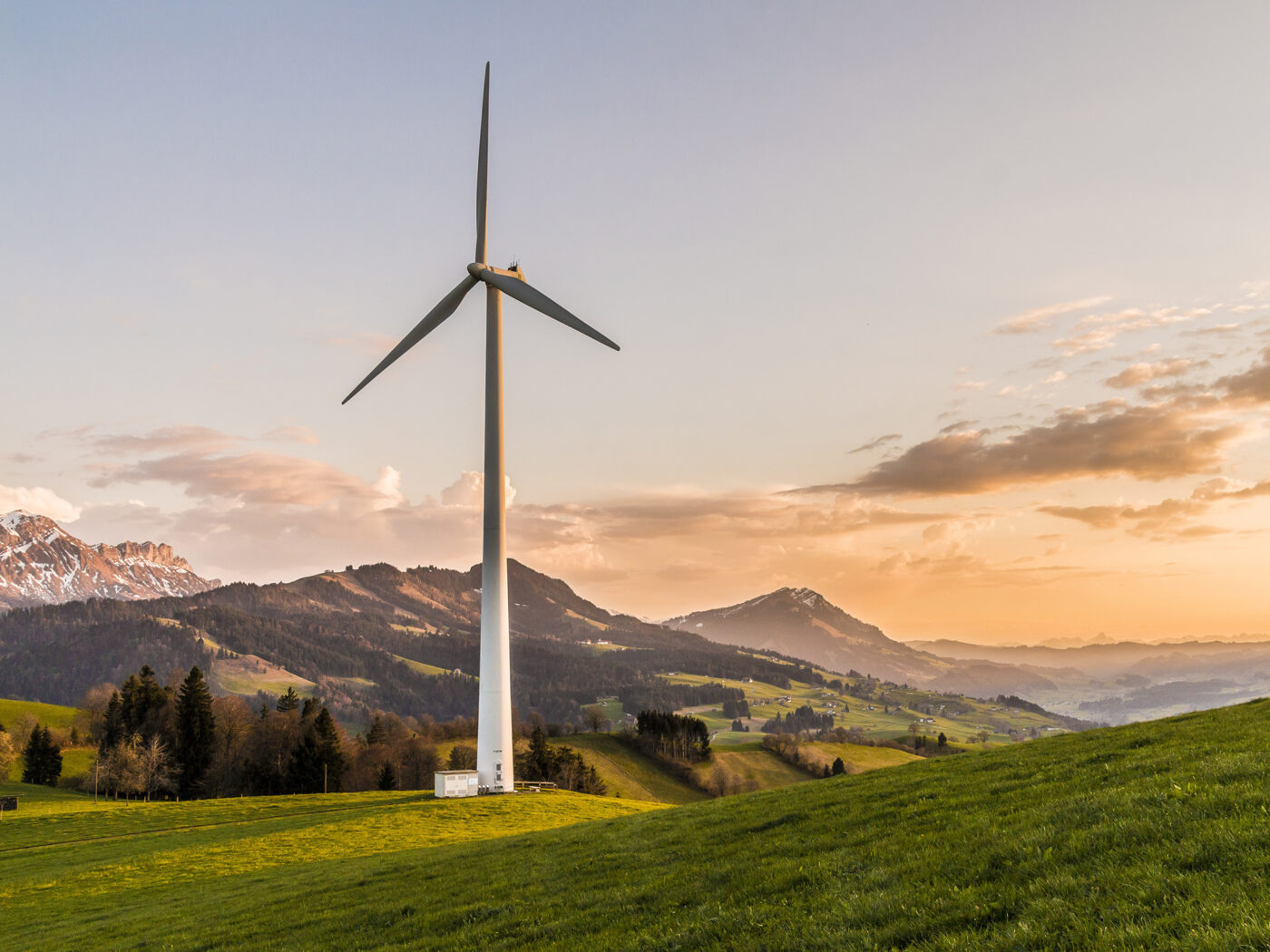 Wind turbine in countryside among mountains